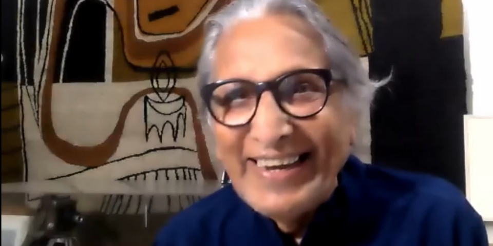 View of Professor Doshi laughing during the interview.
