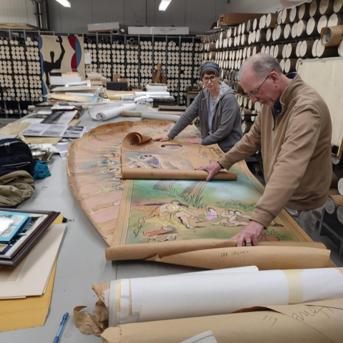Robert Roche and Cathy Lange look over work in the Shepley Bulfinch Archives. Photo by Scott Steffes.