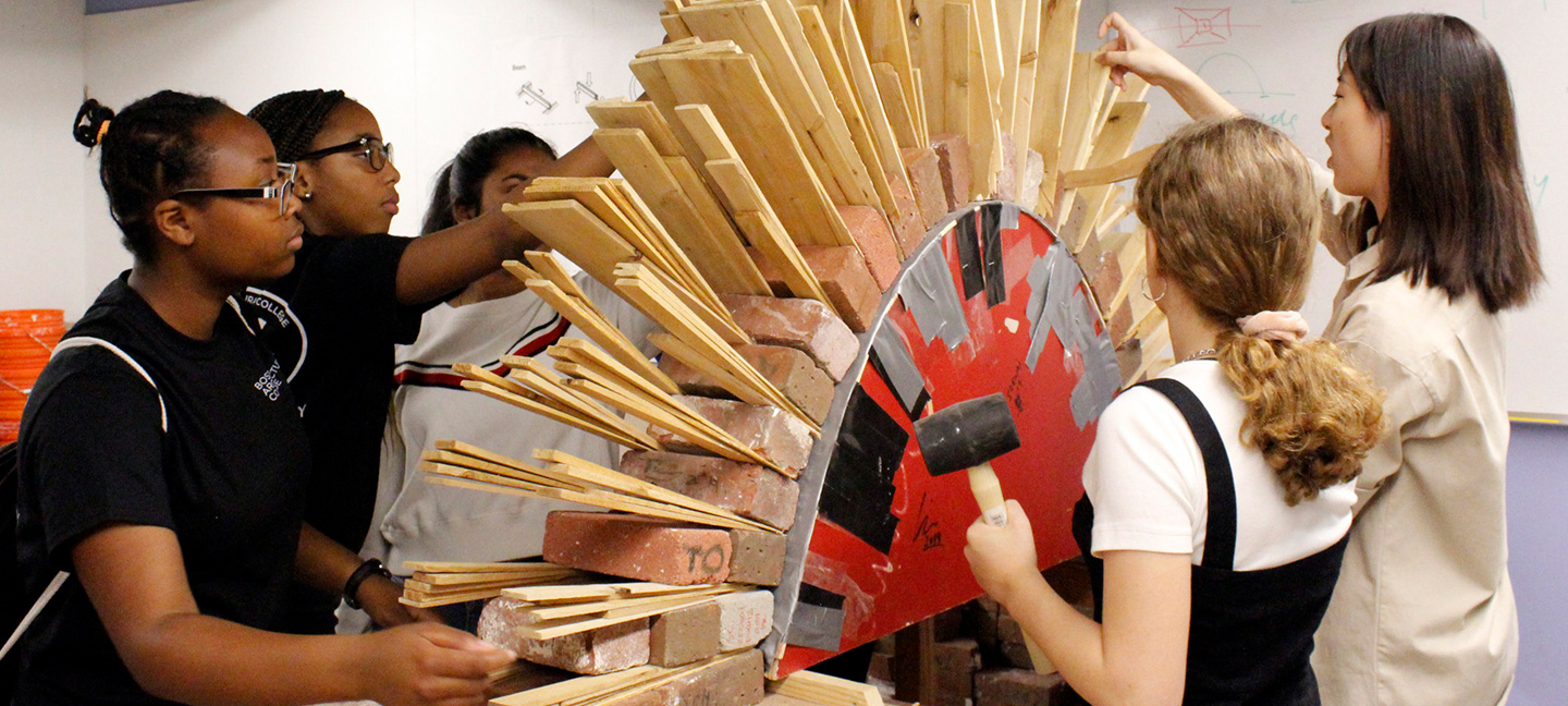 Summer Academy students building a bridge